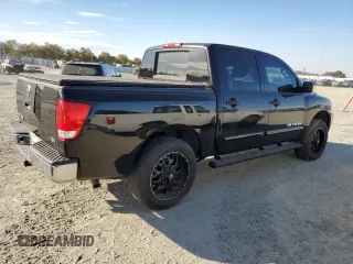 2011 Nissan Titan SL with VIN 1N6AA0ED6BN324814, listed as a Copart auction lot 77460904 with Not Provided miles and Clean Title. Bid and sale history available at DreamBid. Image 3.