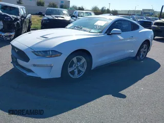 2021 Ford Mustang EcoBoost with VIN 1FA6P8TH5M5146799, listed as a IAAI auction lot 41575950 with 47,037 mi miles. Bid and sale history available at carsss.com. Image 2.