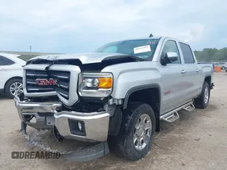 2014 GMC Sierra 1500 SLT with VIN 3GTU2VEC2EG100051, listed as a IAAI auction lot 40363924 with 149,636 mi miles and . Bid and sale history available at DreamBid. Image 2.