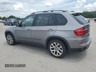 2012 BMW X5 35i with VIN 5UXZV4C59CL991689, listed as a Copart auction lot 64022615 with 208,620 mi miles and Salvage title. Bid and sale history available at DreamBid. Image 2.