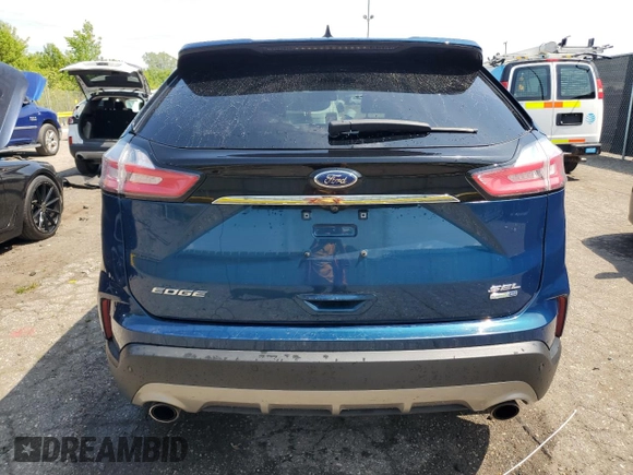 2020 Ford Edge SEL с VIN 2FMPK4J96LBB68740, выставлен на аукционе Copart как лот 61441985 с пробегом 109 389 миль миль и Чистый • Clean title. История ставок и продаж доступна на DreamBid. Изображение 6.