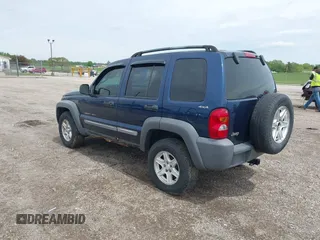 2002 Jeep Liberty Sport with VIN 1J4GL48K42W260513, listed as a IAAI auction lot 42163192 with 146,789 mi miles. Bid and sale history available at carsss.com. Image 3.