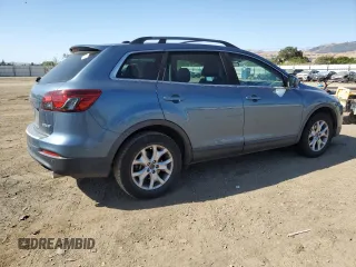 2015 Mazda CX-9 Touring with VIN JM3TB2CV1F0469009, listed as a Copart auction lot 59225785 with 93,330 mi miles and Salvage title. Bid and sale history available at DreamBid. Image 3.