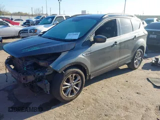 2017 Ford Escape SE z VIN 1FMCU0GD9HUB38906, wystawiony jako IAAI lot #41772488 z przebiegiem 108 259 mil mil oraz . Historia ofert i sprzedaży dostępna na DreamBid. Obrazek 18.