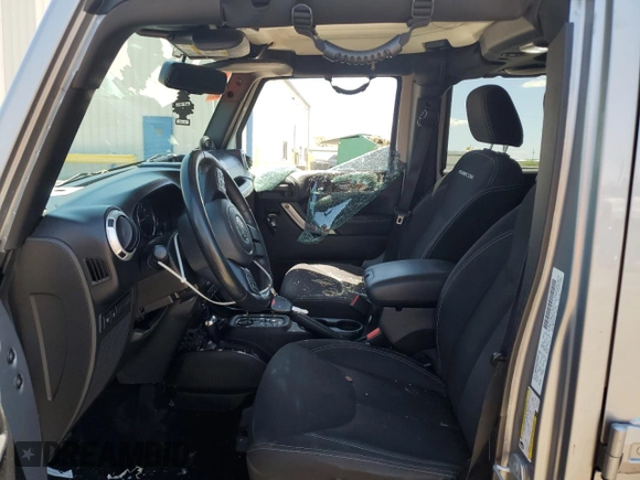 2014 Jeep Wrangler Unlimited Rubicon with VIN 1C4HJWFG1EL241014, listed as a Copart auction lot 63948655 with 165,650 mi miles and Salvage title. Bid and sale history available at DreamBid. Image 7.