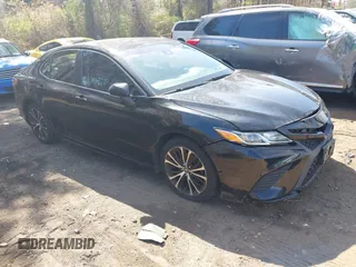 2018 Toyota Camry LE with VIN 4T1B11HK9JU115557, listed as a IAAI auction lot 42087452 with 185,752 mi miles. Bid and sale history available at carsss.com. Image 1.