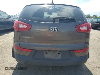 2011 Kia Sportage LX with VIN KNDPBCA2XB7110381, listed as a Copart auction lot 65434035 with 117,025 mi miles and Salvage title. Bid and sale history available at DreamBid. Image 6.