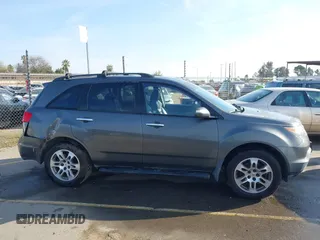 2007 Acura MDX with VIN 2HNYD28297H513434, listed as a IAAI auction lot 41723449 with 199,027 mi miles. Bid and sale history available at carsss.com. Image 13.