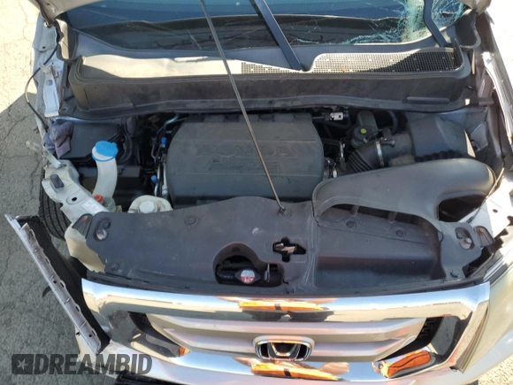 2011 Honda Pilot EX-L z VIN 5FNYF4H50BB061801, wystawiony jako Copart lot #54738365 z przebiegiem 103 719 mil mil oraz Szkoda całkowita • Salvage title. Historia ofert i sprzedaży dostępna na DreamBid. Obrazek 12.