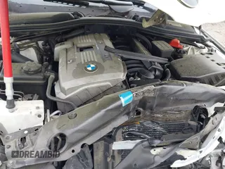 2007 BMW 5 Series 525i with VIN WBANE53547CW59197, listed as a IAAI auction lot 41867885 with 158,839 mi miles and . Bid and sale history available at carsss.com. Image 10.