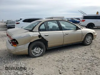 1999 Saturn SL с VIN 1G8ZK5278XZ269792, выставлен на аукционе Copart как лот 48773395 с пробегом 159 506 миль миль и Списание • Salvage title. История ставок и продаж доступна на DreamBid. Изображение 3.