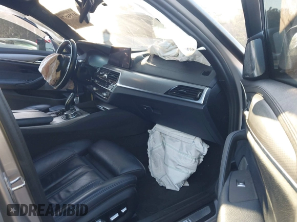 2019 BMW 5 Series M550i xDrive with VIN WBAJB9C50KB464159, listed as a IAAI auction lot 41758879 with 9,000 mi miles and . Bid and sale history available at DreamBid. Image 5.