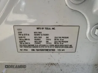 2022 Tesla Model Y Performance z VIN 7SAYGDEF0NF337959, wystawiony jako Copart lot #56871985 z przebiegiem 54 527 mil mil oraz Szkoda całkowita • Salvage title. Historia ofert i sprzedaży dostępna na DreamBid. Obrazek 12.