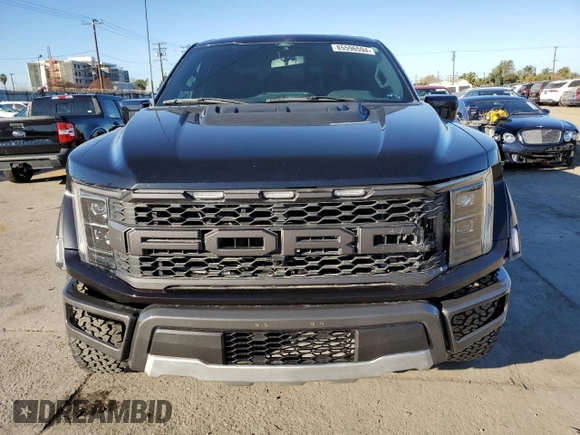2021 Ford F-150 Raptor with VIN 1FTFW1RG3MFC62242, listed as a Copart auction lot 85596594 with 33,497 mi miles and Salvage Title. Bid and sale history available at carsss.com. Image 5.