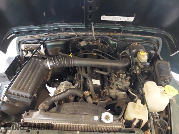 2000 Jeep Wrangler Sport with VIN 1J4FA49S8YP780104, listed as a IAAI auction lot 42095731 with Not provided miles and . Bid and sale history available at DreamBid. Image 10.