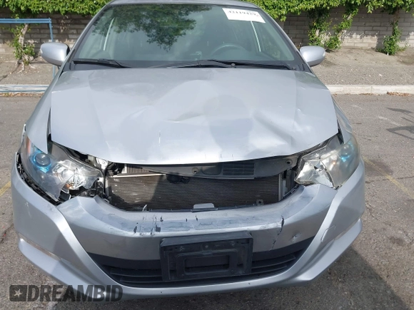 2010 Honda Insight EX with VIN JHMZE2H75AS003695, listed as a IAAI auction lot 42119429 with 90,901 mi miles and . Bid and sale history available at DreamBid. Image 6.