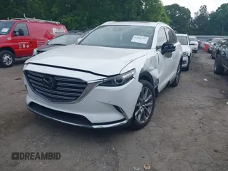 2019 Mazda CX-9 Signature with VIN JM3TCBEY8K0327724, listed as a IAAI auction lot 42068769 with 77,823 mi miles and . Bid and sale history available at DreamBid. Image 17.