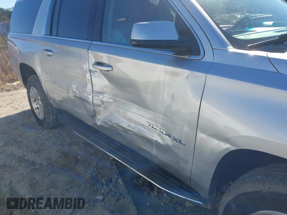 2019 GMC Yukon XL SLT with VIN 1GKS1GKC6KR244728, listed as a IAAI auction lot 41420847 with 138,527 mi miles. Bid and sale history available at carsss.com. Image 6.