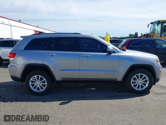 2016 Jeep Grand Cherokee Laredo z VIN 1C4RJFAG7GC392261, wystawiony jako IAAI lot #41890922 z przebiegiem 107 546 mil mil oraz . Historia ofert i sprzedaży dostępna na DreamBid. Obrazek 13.