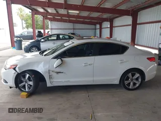 2014 Acura ILX with VIN 19VDE1F35EE013425, listed as a IAAI auction lot 42649299 with 102,589 mi miles and . Bid and sale history available at DreamBid. Image 14.