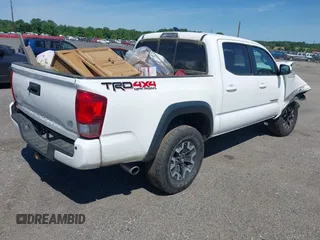 2016 Toyota Tacoma SR with VIN 3TMCZ5AN0GM003224, listed as a IAAI auction lot 42289910 with 140,899 mi miles and . Bid and sale history available at DreamBid. Image 4.