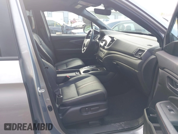 2023 Honda Passport TrailSport z VIN 5FNYF8H6XPB044222, wystawiony jako IAAI lot #42134331 z przebiegiem 19 026 mil mil oraz . Historia ofert i sprzedaży dostępna na DreamBid. Obrazek 5.