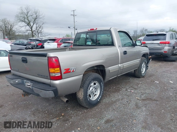 1999 Chevrolet Silverado 1500 LS with VIN 1GCEK14T3XZ161362, listed as a IAAI auction lot 41973905 with 153,845 mi miles. Bid and sale history available at carsss.com. Image 4.