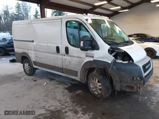 2021 Ram ProMaster Cargo Van with VIN 3C6LRVAG0ME565199, listed as a IAAI auction lot 41237512 with 239,904 mi miles. Bid and sale history available at carsss.com. Image 1.