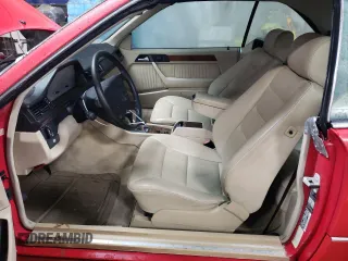 1994 Mercedes-Benz E 320 with VIN WDBEA66E8RC044069, listed as a Copart auction lot 87713565 with 69,061 mi miles and Salvage Title. Bid and sale history available at DreamBid. Image 7.