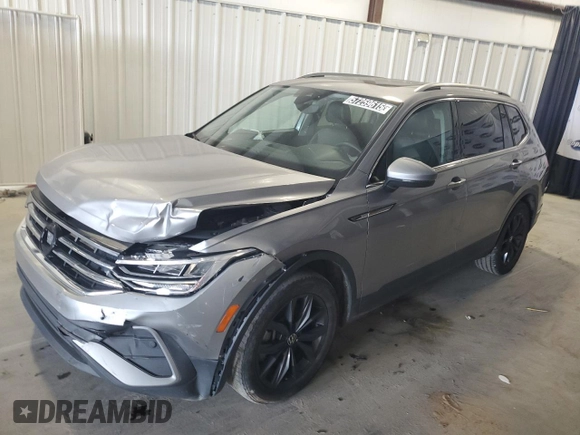 2022 Volkswagen Tiguan SE z VIN 3VV3B7AX6NM034235, wystawiony jako Copart lot #57259615 z przebiegiem 65 424 mil mil oraz Czysty tytuł • Clean title. Historia ofert i sprzedaży dostępna na DreamBid. Obrazek 1.