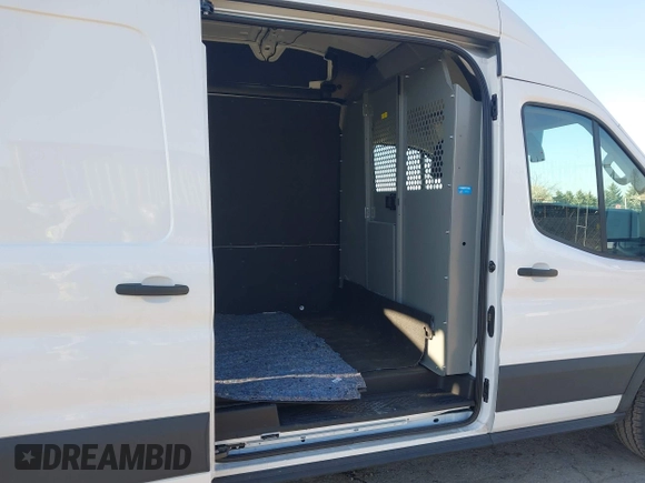 2024 Ford Transit Cargo z VIN 1FTBW3X89RKB49268, wystawiony jako IAAI lot #42081360 z przebiegiem 7 290 mil mil oraz . Historia ofert i sprzedaży dostępna na DreamBid. Obrazek 8.