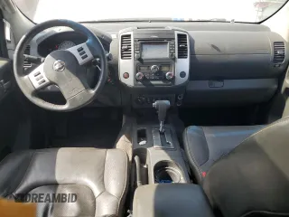 2015 Nissan Frontier Pro-4X with VIN 1N6AD0EV5FN700571, listed as a Copart auction lot 50974615 with 138,930 mi miles and Salvage title. Bid and sale history available at DreamBid. Image 8.