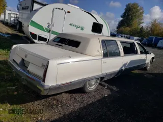 1995 Cadillac Fleetwood z VIN 1G6DW52P2SR700272, wystawiony jako Copart lot #77906824 z przebiegiem Nie podano mil oraz Szkody całkowita. Historia ofert i sprzedaży dostępna na DreamBid. Obrazek 3.