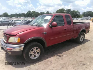 2002 Ford F-150 XL with VIN 1FTRX18W72NB97997, listed as a IAAI auction lot 42578237 with Not provided miles and . Bid and sale history available at DreamBid. Image 2.