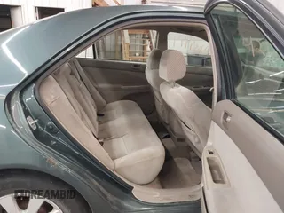2004 Toyota Camry LE with VIN 4T1BE32K04U361670, listed as a IAAI auction lot 42139994 with 205,899 mi miles. Bid and sale history available at carsss.com. Image 8.