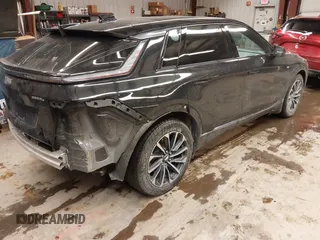 2024 Cadillac LYRIQ Sport z VIN 1GYKPTRL4RZ104562, wystawiony jako IAAI lot #41543433 z przebiegiem 50 121 mil mil oraz . Historia ofert i sprzedaży dostępna na DreamBid. Obrazek 4.