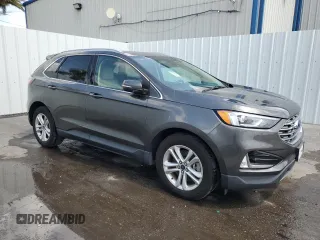 2020 Ford Edge SEL с VIN 2FMPK4J95LBB17293, выставлен на аукционе Copart как лот 58796255 с пробегом 82 583 миль миль и Чистый • Clean title. История ставок и продаж доступна на DreamBid. Изображение 4.