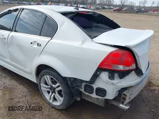 2009 Pontiac G8 with VIN 6G2ER57729L153123, listed as a IAAI auction lot 42046031 with 100,419 mi miles. Bid and sale history available at carsss.com. Image 14.