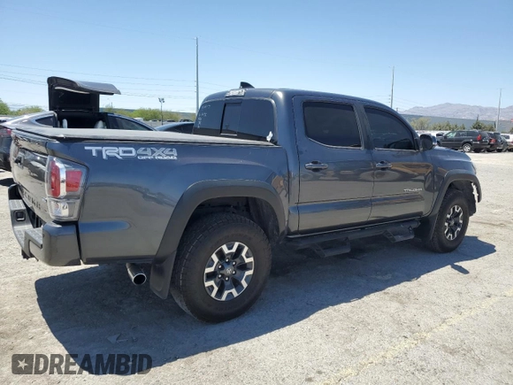 2022 Toyota Tacoma SR with VIN 3TMCZ5AN5NM482575, listed as a Copart auction lot 61498025 with 49,046 mi miles and Salvage title. Bid and sale history available at DreamBid. Image 3.