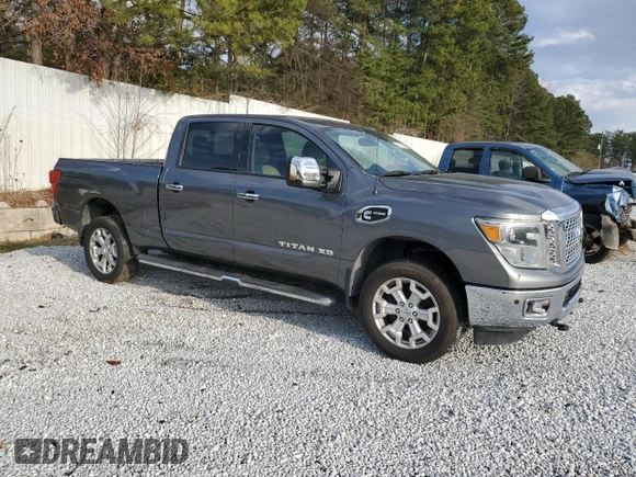 2016 Nissan Titan SL z VIN 1N6BA1F29GN515240, wystawiony jako Copart lot #45185835 z przebiegiem 137 164 mil mil oraz Czysty tytuł • Clean title. Historia ofert i sprzedaży dostępna na DreamBid. Obrazek 4.