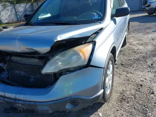 2007 Honda CR-V EX with VIN JHLRE48577C024338, listed as a IAAI auction lot 42068770 with 197,943 mi miles. Bid and sale history available at carsss.com. Image 14.