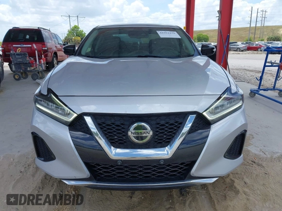 2020 Nissan Maxima SV z VIN 1N4AA6CV6LC366887, wystawiony jako IAAI lot #41952159 z przebiegiem 100 182 mil mil oraz . Historia ofert i sprzedaży dostępna na DreamBid. Obrazek 12.