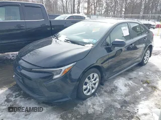2023 Toyota Corolla Hybrid LE with VIN JTDBDMHE7P3004396, listed as a IAAI auction lot 41606222 with 15,037 mi miles. Bid and sale history available at carsss.com. Image 2.