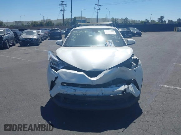 2019 Toyota C-HR XLE with VIN JTNKHMBX4K1040772, listed as a IAAI auction lot 41812031 with 79,729 mi miles. Bid and sale history available at carsss.com. Image 13.