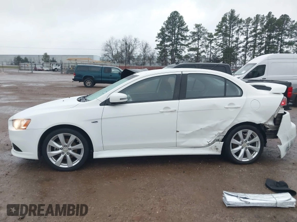 2015 Mitsubishi Lancer GT with VIN JA32U8FW5FU008618, listed as a IAAI auction lot 41290204 with 115,854 mi miles. Bid and sale history available at carsss.com. Image 14.