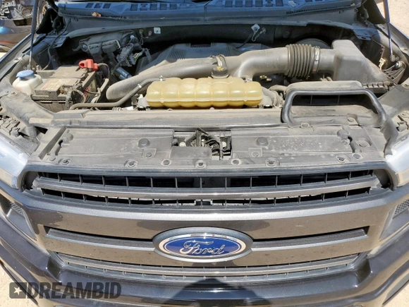 2019 Ford F-150 XL with VIN 1FTEW1C42KKD88588, listed as a Copart auction lot 59894575 with 70,948 mi miles and Salvage title. Bid and sale history available at DreamBid. Image 11.