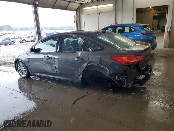 2016 Ford Focus SE z VIN 1FADP3F22GL298136, wystawiony jako Copart lot #58539185 z przebiegiem 101 580 mil mil oraz Szkoda całkowita • Salvage title. Historia ofert i sprzedaży dostępna na DreamBid. Obrazek 2.
