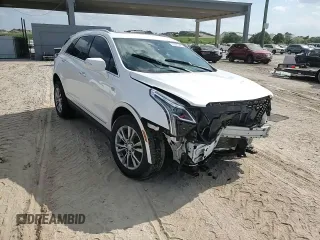 2021 Cadillac XT5 FWD Premium Luxury z VIN 1GYKNCRS7MZ115531, wystawiony jako Copart lot #53611095 z przebiegiem 34 931 mil mil oraz Szkoda całkowita • Salvage title. Historia ofert i sprzedaży dostępna na DreamBid. Obrazek 14.