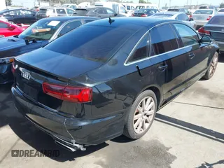 2016 Audi A6 Premium with VIN WAUCFAFC7GN162981, listed as a IAAI auction lot 42660005 with 148,038 mi miles and . Bid and sale history available at DreamBid. Image 4.