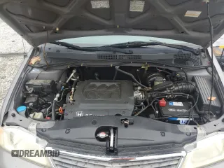 2000 Honda Odyssey EX with VIN 2HKRL1865YH513885, listed as a Copart auction lot 50223505 with 214,627 mi miles and Salvage Title. Bid and sale history available at DreamBid. Image 14.